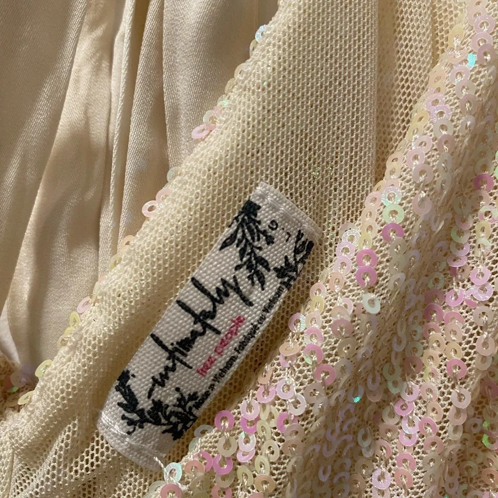 Free People Gold Rush Mini Dress in Icicle Pearl Combo. Perfect for Coachella